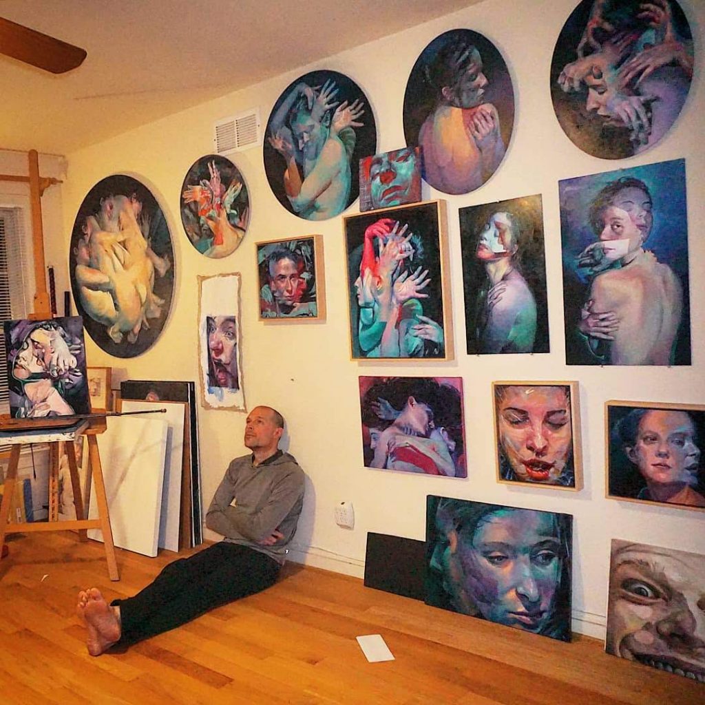 Scott Hutchison sitting on the floor in his studio
